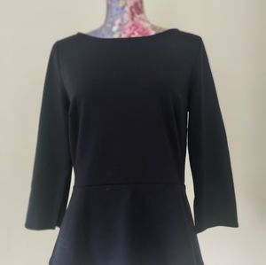 Beautiful Ann Taylor navy peplum top, size M